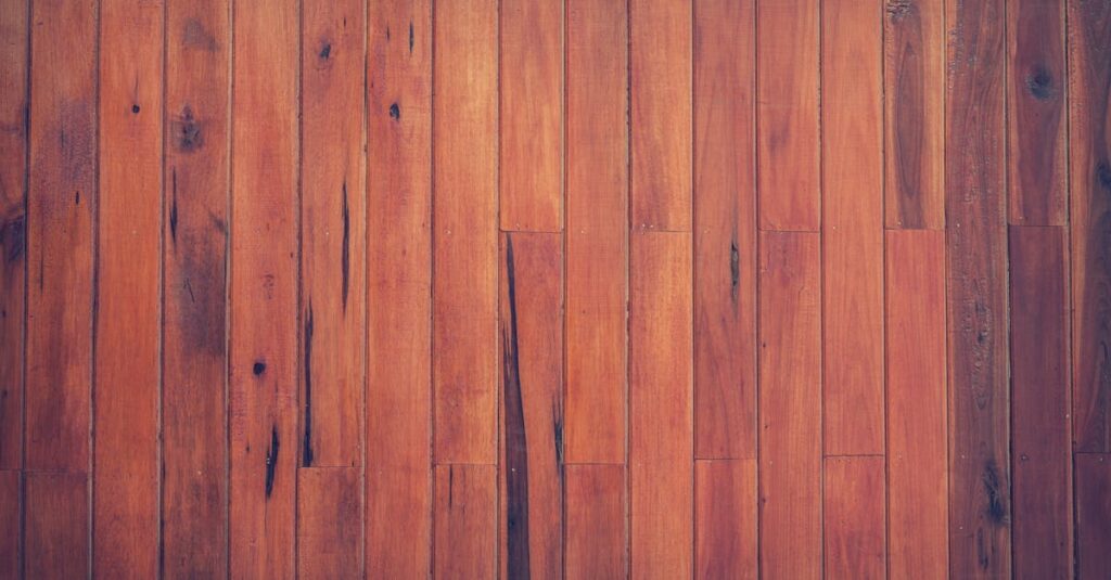 ニトリの木目調ジョイント防音マットをリビングに設置した写真。トランポリンの下にぴったり敷かれている