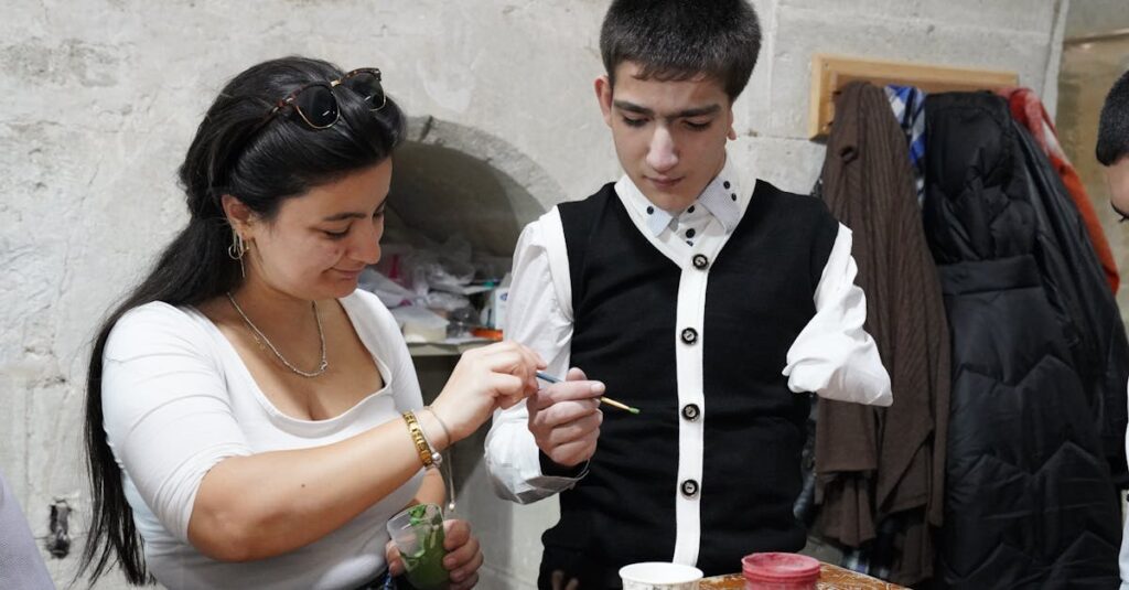 トランポリン体験レッスンで丁寧に教えるコーチ