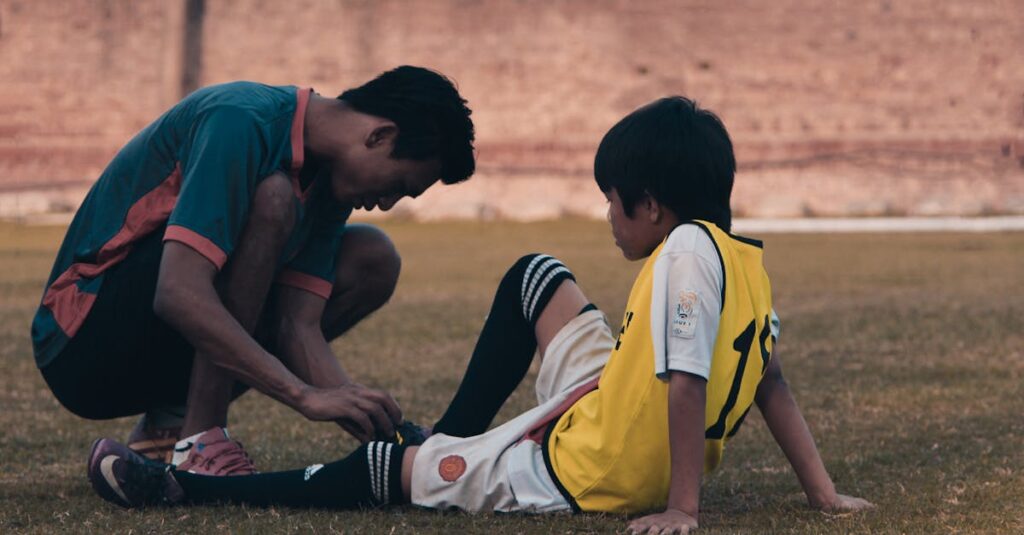 トランポリンのレッスン後に子どもと保護者へ成長を伝える先生