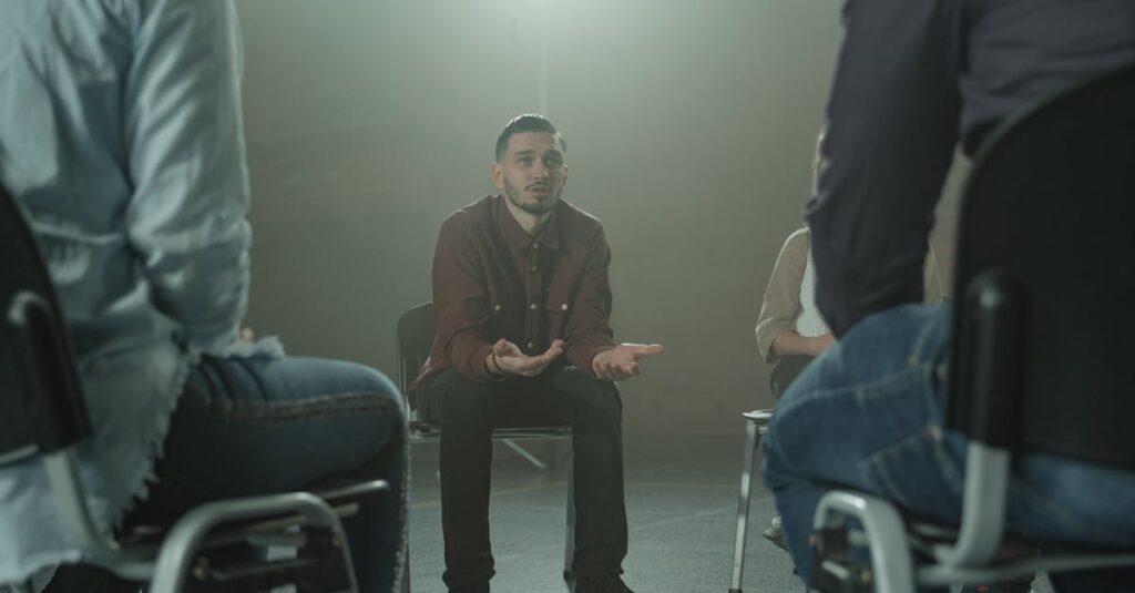 保護者と丁寧に会話するトランポリンの先生