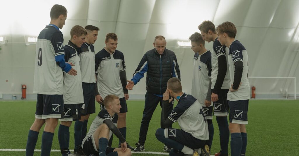 保護者と丁寧に会話するトランポリンの先生