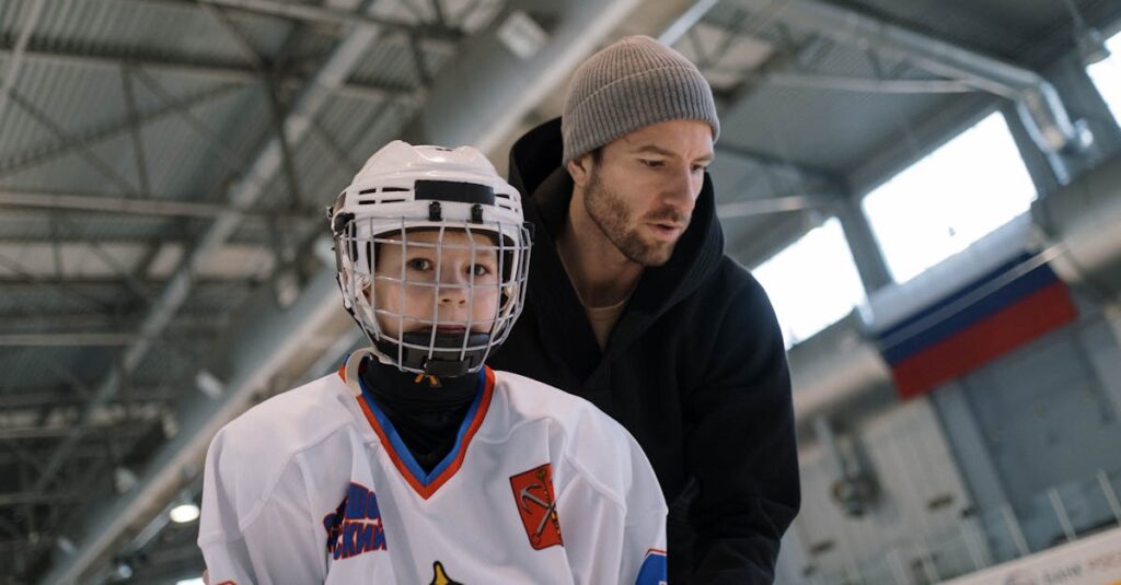 保護者と丁寧に会話するトランポリンの先生