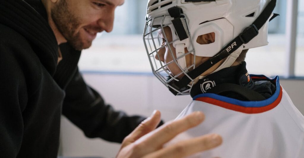 トランポリン教室で先生と相談する保護者