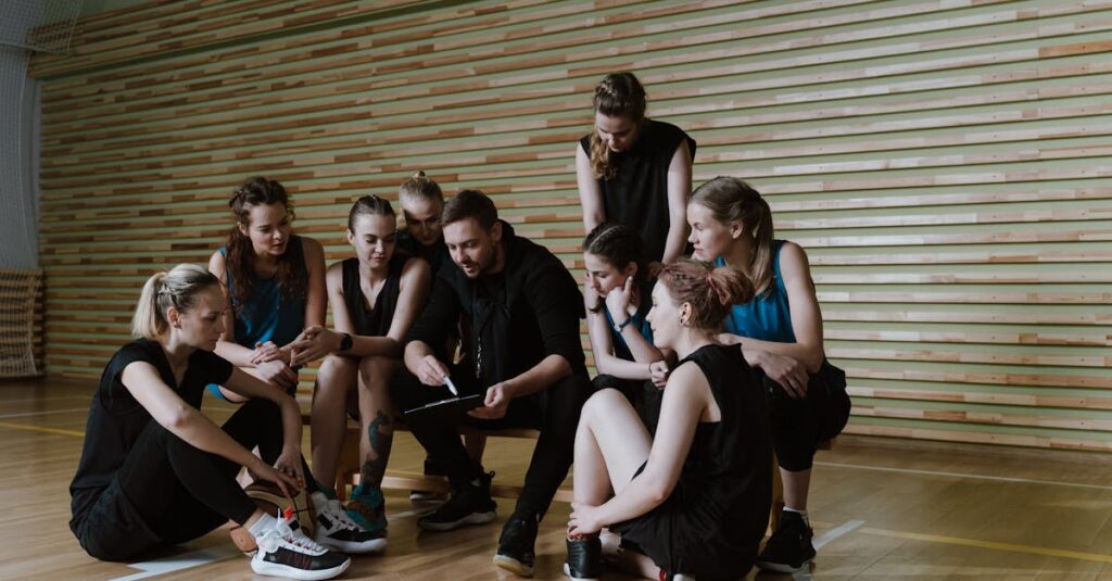 トランポリン教室で先生と相談する保護者